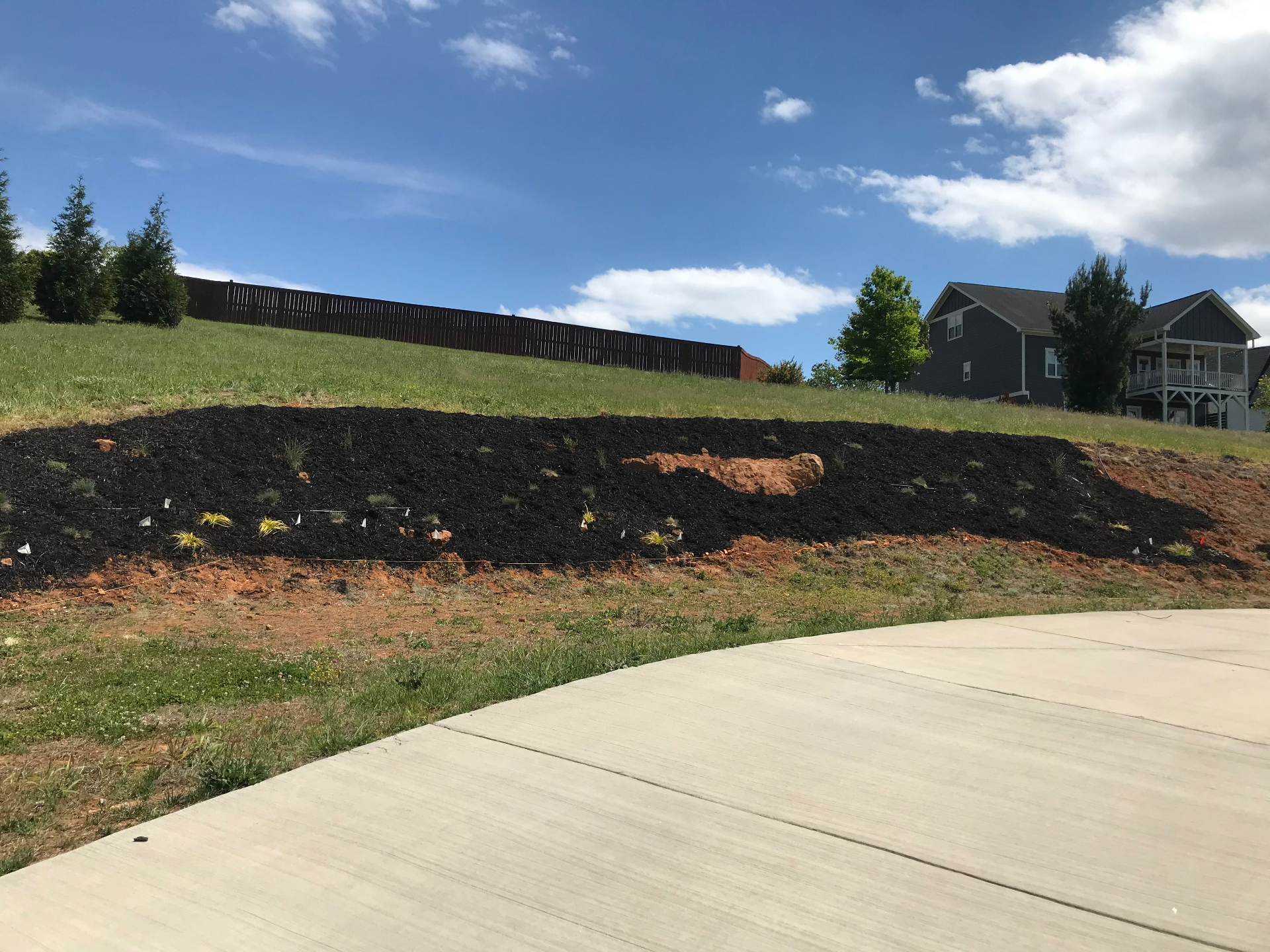 Fresh mulch on landscaped hillside